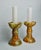 Very nice pair of onyx and brass candlesticks designated and produced in Italy in the 1980s. These candlesticks retain...