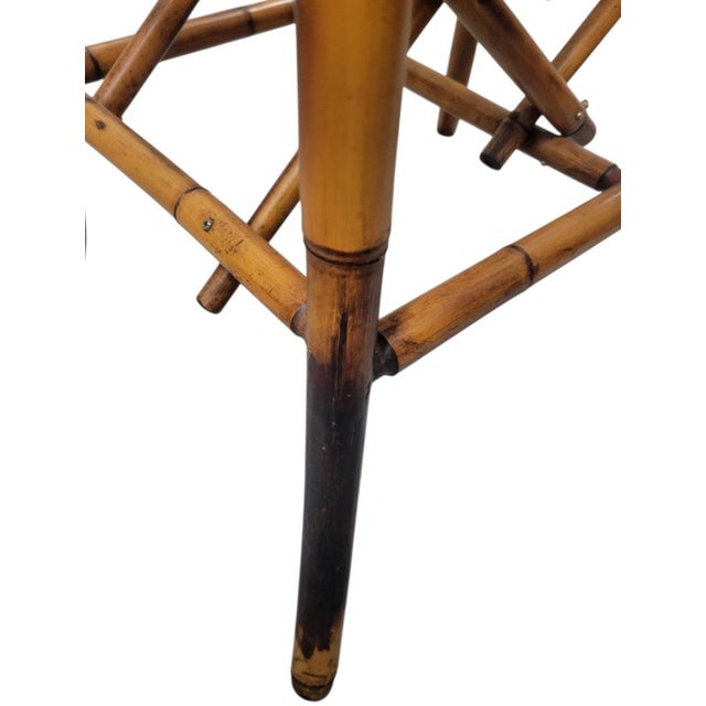 A beautiful vintage burnt bamboo side table bottle wine rack holder.. This is such a pretty real bamboo side table with a...