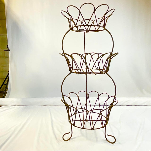 This is a gorgeous antique French Iron Garden Jardiniere Planter Stand. It has 3 Tiers, each in the shape of a Daisy. They...