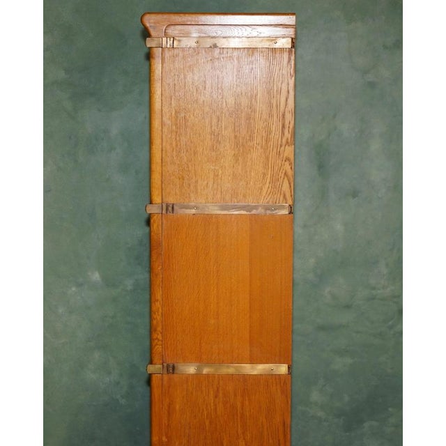 Antique Modular Honey Oak and Gilt Brass Stacking Bookcase with Glazed Retracting Doors For Sale - Image 12 of 18