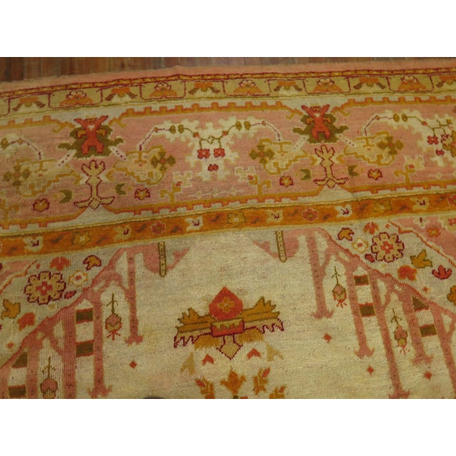 1900 - 1909 Ivory and Pink Antique Turkish Oushak Rug - 10'3" x 13'4" For Sale - Image 5 of 12