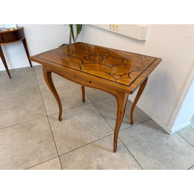 Biedermeier Table. Side table. Dimensions: Height x Width x Depth 77 x 92 x 65 cm. For sale is an exceptionally elegant...