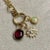 Created in 18 karat yellow gold Rhodolite garnet 3.50 carats approx. Opal 0.80 carat approx. Diamonds 0.10 carat approx....