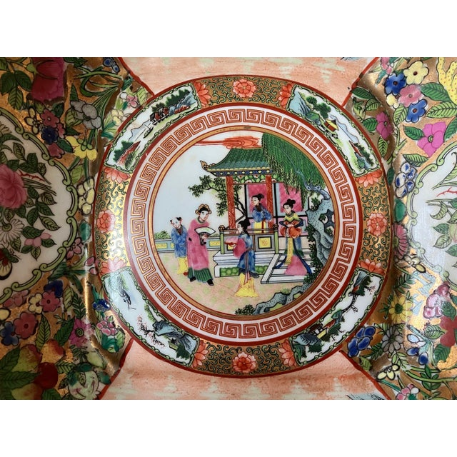 This vibrant square porcelain bowl showcases the ornate beauty of Chinese Famille Rose and Rose Medallion styles, with...