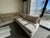 Used - like new Original Kreiss Couches Purchased new at $10,000 each. • Two couches: Cream and Chocolate Brown • Includes...
