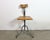 Industrial height adjustable swivel chair made in former Czechoslovakia during the 1950s.The construction is made of gray...