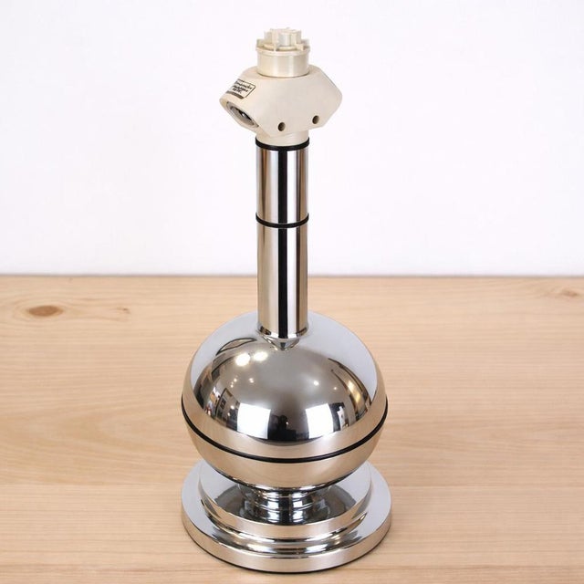 Space Age style table lamp from the 1970s by BD Lumica with a chrome-plated metal base. Suitable for two E27 bulbs. This...