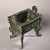 This is a cast bronze rectangular ritual vessel, featuring a sturdy, box-like body supported by four distinctive legs and...
