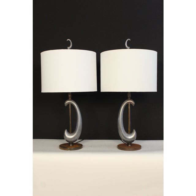 Pair of Gerald Thurston influence lamps. Unusual sculptural style Interesting detail macking pieces unique. Burnished...