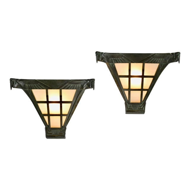 Pair of art deco pelican sconces by max le verrier, dating from 1930. The sconces are made of green patinated metal with...