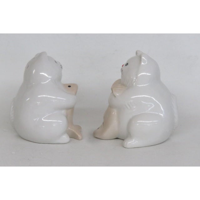 Figurative Mid 20th Century Ceramic Salt and Pepper Shakers White Cats Holding Beige Fish - a Pair For Sale - Image 3 of 8
