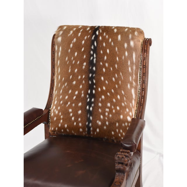 19th century gentleman's library chair fully restored with real Axis deer hide and Chesterfield oil-tanned leather. The...