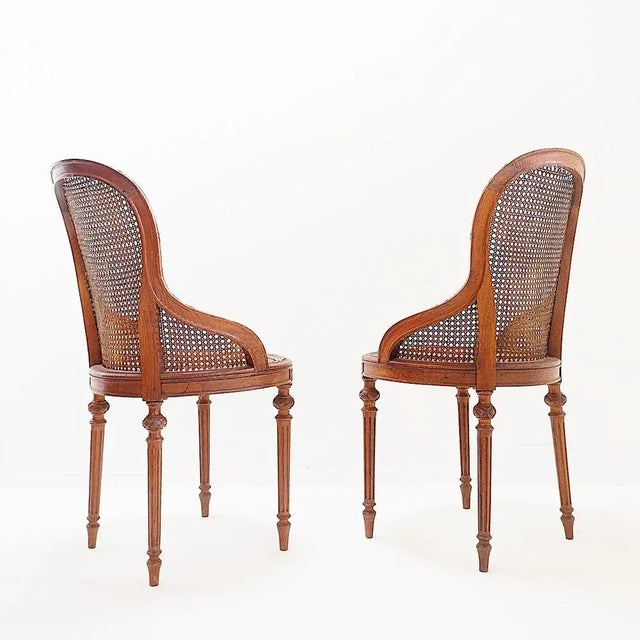 Pair of Louis XVI style mahogany armchairs – Early 20th century Antique occasional chairs – 20th century Dimensions: 54 x...