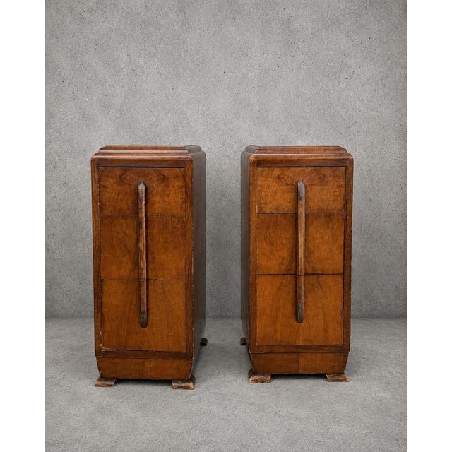 Details * Original Art Deco design * Beautiful walnut veneer with striking grain patterns * Sculptural elongated carved...
