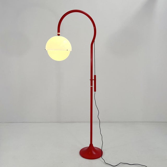 Red Model 4055 Floor Lamp attributed to Luigi Bandini Buti for Kartell, 1960s, in Good conditions. Designed 1960 to 1969...