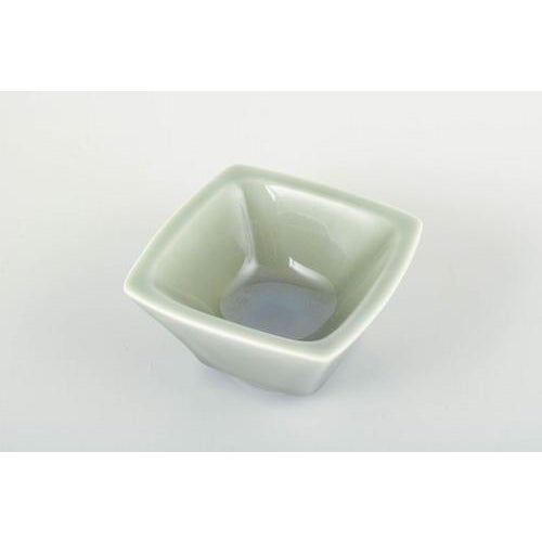 Nils Thorsson for Royal Copenhagen. Square ceramic bowl in green celadon glaze. Designer: Nils Thorsson Model: 2876...
