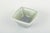Nils Thorsson for Royal Copenhagen. Square ceramic bowl in green celadon glaze. Designer: Nils Thorsson Model: 2876...