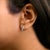 10K White Gold 1/10 Cttw Three Stone Lab Grown Diamond Oval Huggies Hoop Earrings For Sale - Image 4 of 5