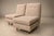 Designed by Joaquim Tenreiro (1906–1992), this exceptional pair of “L” lounge chairs, conceived in 1958, exemplifies the...