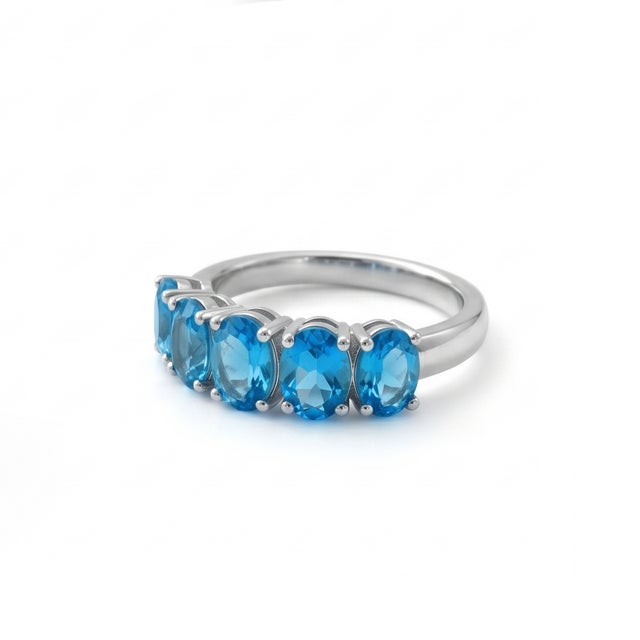 Contemporary Swiss Blue Topaz Half Band Ring, Stackable Birthstone Ring Us 7 For Sale - Image 3 of 4
