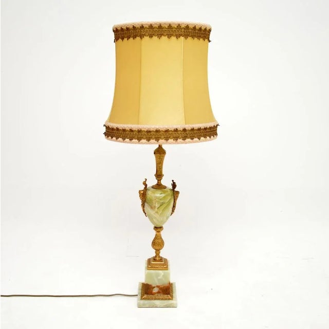 A large and impressive antique French table lamp in onyx and gilt metal. This was made in France and dates from around the...
