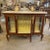 In love with the details. Stunning french vitrine. Has a beautiful gold details and it has a yellow internal upholstery...