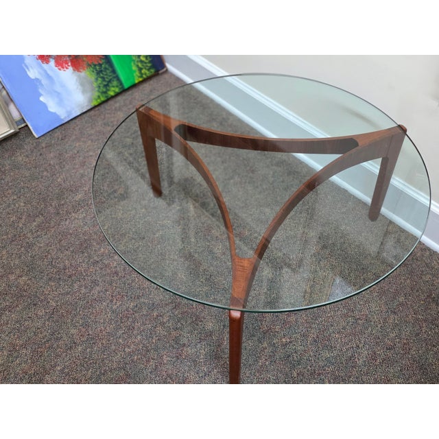 This is a Round Danish Coffee Table, Model #104, designed by Sven Ellekaer for Christian Linneberg in 1962. It has a...