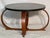 Elevate your living space with this stunning Art Deco coffee table. The elegant design features a sleek, round black...