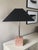 A modernist lamp with a pink marble cube base and a nickel column, made in Italy in the 1980s. The tapered square shade is...