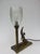 An extraordinary table lamp, made in France during the Art Deco period. It is of high-quality craftsmanship. The base is...
