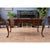 This Chippendale style Mahogany and Leather French Desk is produced by Niagara Furniture. A high quality writing desk that...