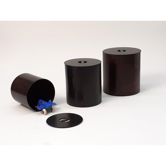 The Villahomecollection round container in mocha-stained beech wood adapts to its specific function depending on the space...