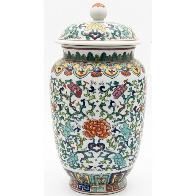 Qianlong of the Qing Dynasty Vibrant Jar with Lid and Maker Marks has measurements of approximately 7"x7"x14" with Lid on.