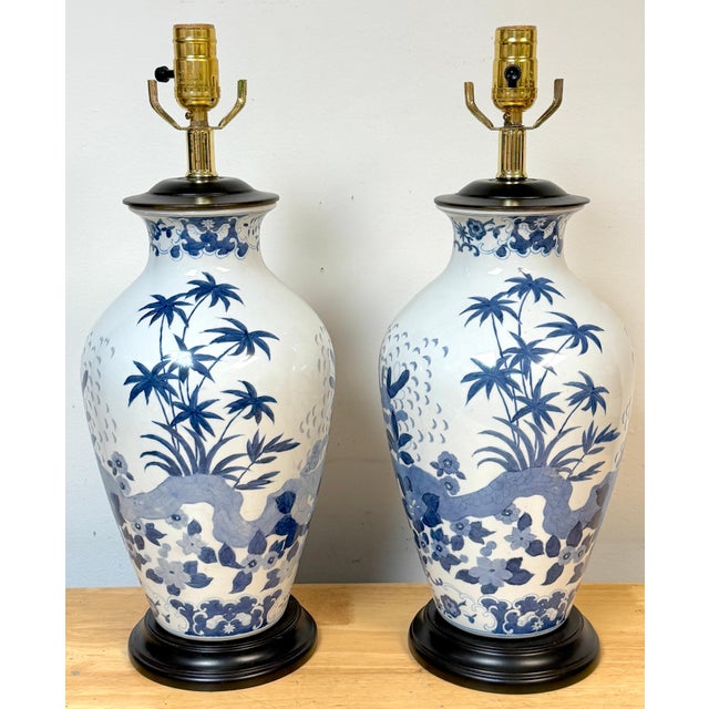 Pair of Chinese Canton-Style Blue and White Palm Tree Porcelain Vases, Now as Lamps This elegant pair of Chinese Canton-...