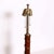 Single Classically styled table lamp in the form of a column decorated with bronze foliate bands at the top and bottom....