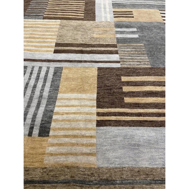 Beautiful hand knotted modern rug. Made of 75% wool and 25% cotton with very modern design and colors, this extremely...