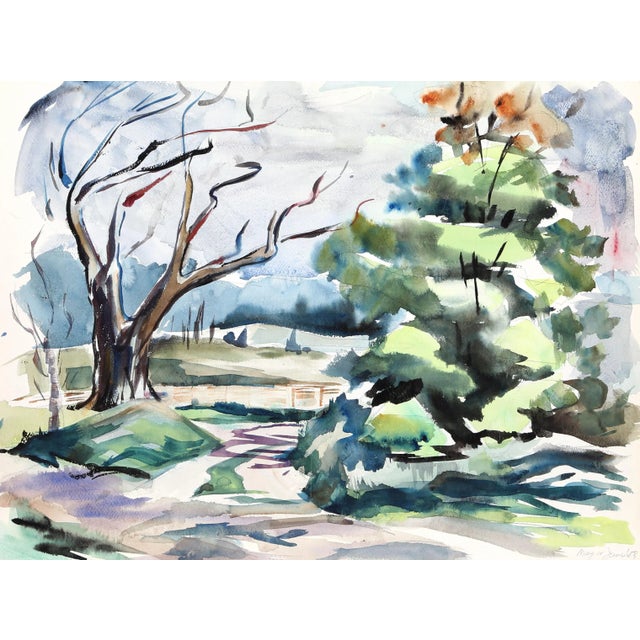 Peering out into the wooded landscape, Eve Nethercott's watercolor features vibrant emerald green trees and a soft aqua...