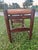 A charming country bench, a discreet reminder of early 20th-century french rural life. its dark solid wood frame—oak or...
