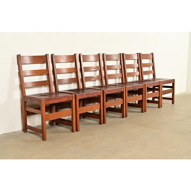 An exceptional set of six antique Mission or Arts & Crafts period ladder back dining chairs By L. & J.G. Stickley USA,...