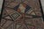 This antique 3x5 hooked rug, circa 1920–1929, features an expressive geometric visual juxtaposition of angular motifs and...