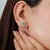 Vintage-inspired marquise-cut emerald and diamond stud earrings featuring 1.8 carats of emeralds in an elegant elongated...