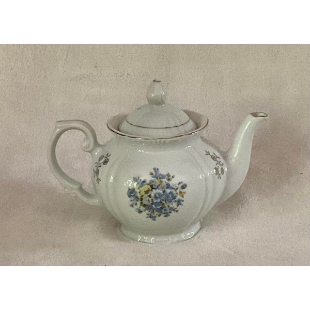 Vintage decorative porcelain tea pot no. 2602 imported by HARUTA & CO., INC. New York, N. Y. Made in Japan. Comes with...