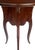 featuring a round dish-top above a shapely tripod base with scalloped apron and adorned with foliate scrolls all raised on...