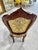 Add timeless elegance to your home with this French Rococo-style vintage chair. Featuring a hand-carved wooden frame, it...