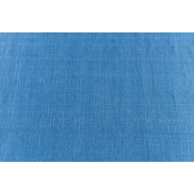 This refined vintage Indian Dhurrie rug, woven circa 1955, embodies the understated elegance and versatility...