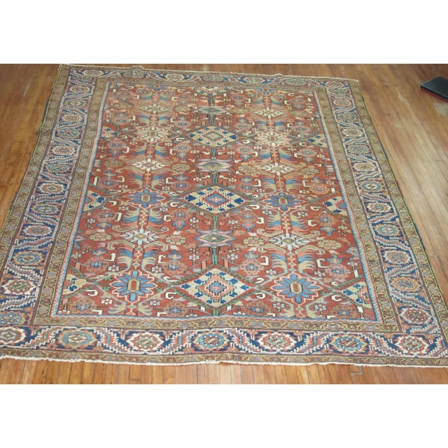 An early 20th Century room size Persian Heriz rug with an all-over design. No wear , great overall condition.