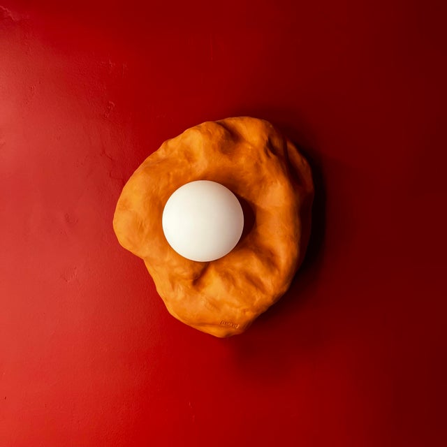 Carefully handcrafted wall or table light by using only manual techniques created by Lisbon-based ceramic artist Anna...