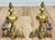Antique French Baroque style brass andirons-chenets. Each features decorative maiden cast onto an ornate, scrolling...