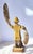This folk art paddle-armed whirligig sailor in his yellow slicker is the carving of a creative but untrained primitive...