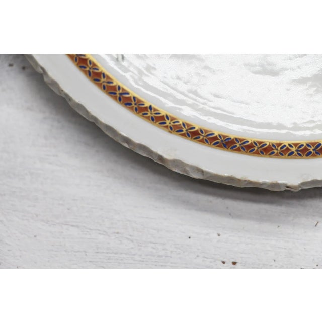 Origin: China Circa: 18th Century. Material: Porcelain. Item condition: One hairline fracture to the rim. Chips along the...